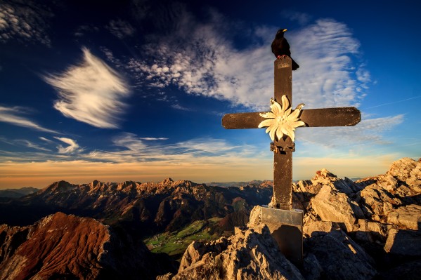 a bird on a cross by zoltanduray